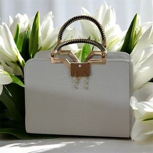 Elegant White Faux Alligator Handbag with Gold Accents & Earrings
